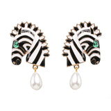 <tc>Años 70</tc> Pendientes Retro Safari